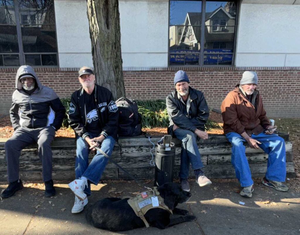 breaking-bread-6 Chuck Jones and his dog, Midnight (center left) enjoying an outing with Breaking Bread shelter residents.