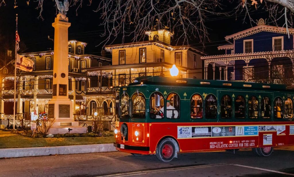 cape-may-holidays-7 A trolley goes by Victorian homes lit up with lights