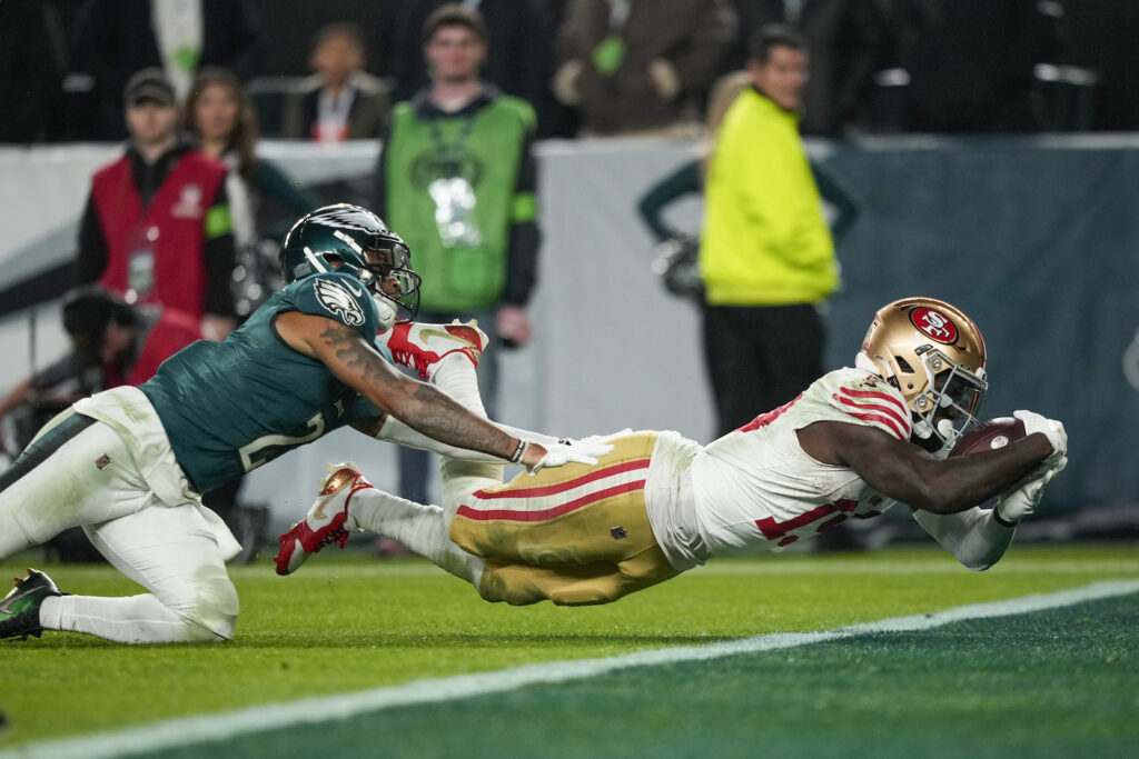 San Francisco 49ers wide receiver Deebo Samuel, right, dives in for a touchdown as Philadelphia Eagles cornerback Darius Slay tries to stop him San Francisco 49ers wide receiver Deebo Samuel, right, dives in for a touchdown as Philadelphia Eagles cornerback Darius Slay tries to stop him