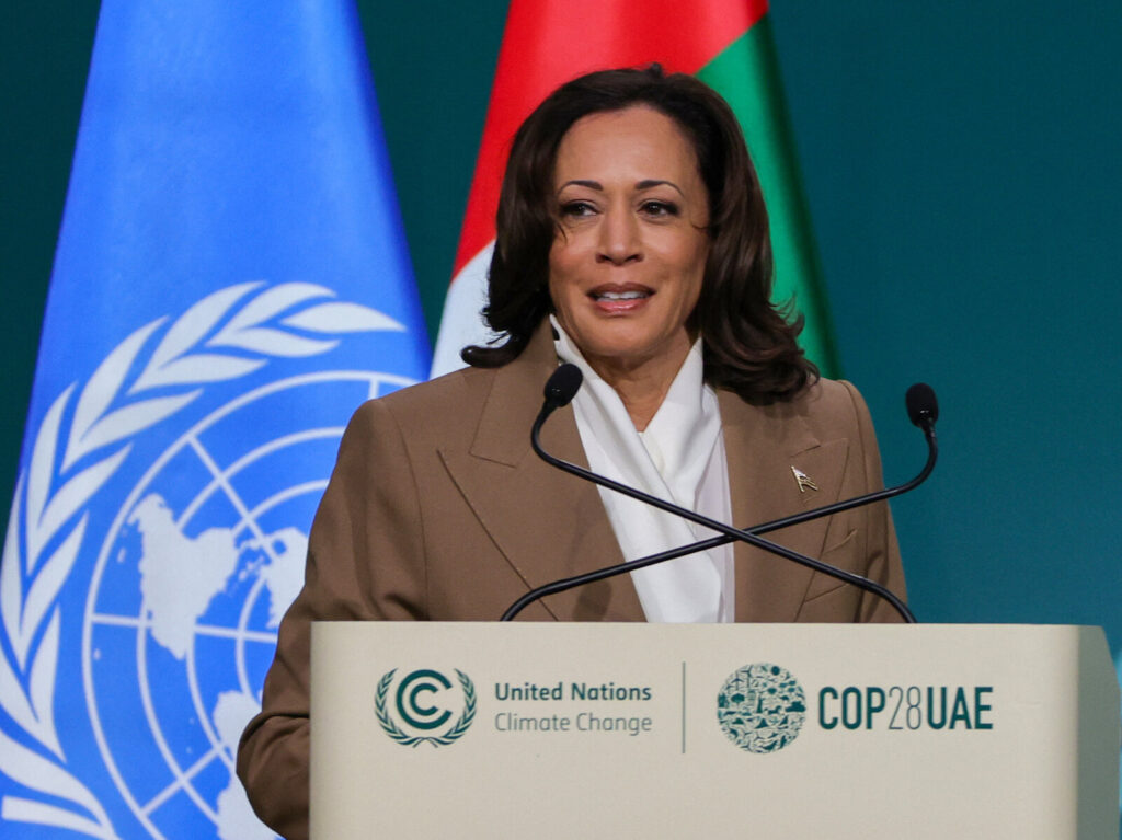 UAE-UN-CLIMATE-COP28 Kamala Harris speaks from a podium