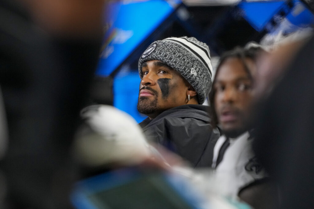 Dak Prescott Philadelphia Eagles quarterback Jalen Hurts looks on from the bench