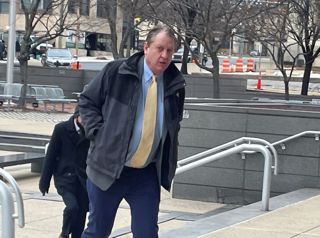 ledyard walks into courthosue Benjamin Ledyard arriving at the courthouse