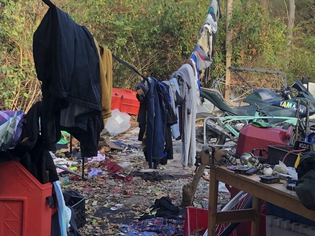 clothes hanging up at an encampment