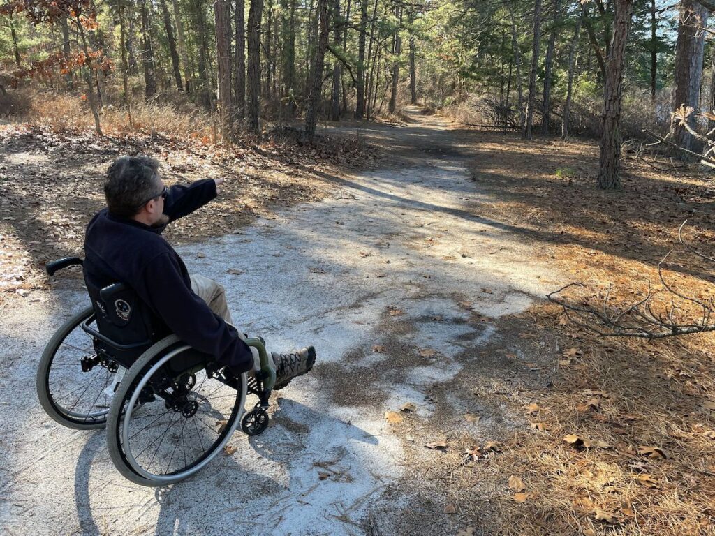 Sean Holland points towards a path