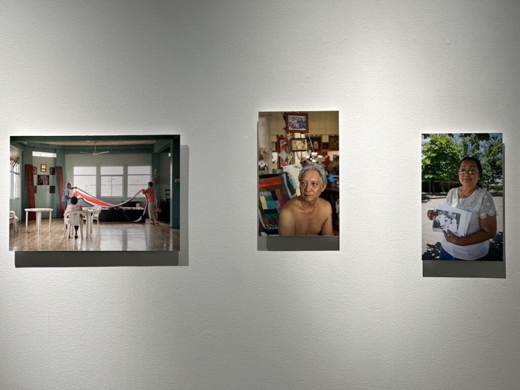 Photographs displayed on a wall