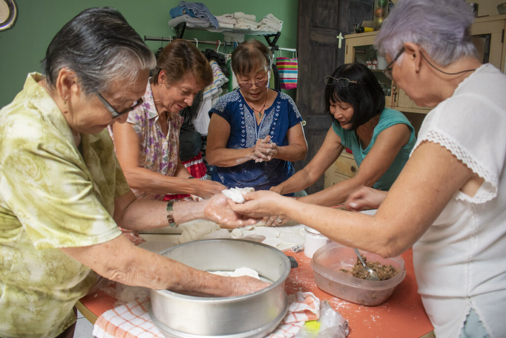 Flora and friends making har gao