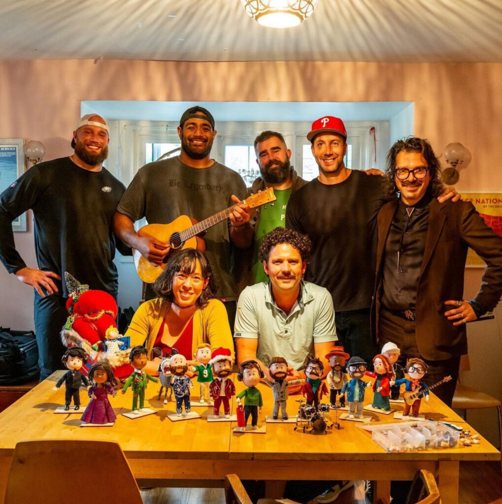 unPOP_Philly_Special Peter Heacock and Marie Hart of unPOP Animations with Philadelphia Eagles players and the puppets created for the stop-motion animated video.