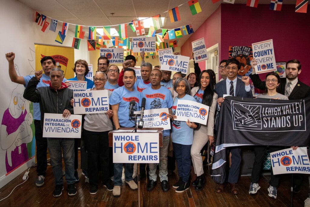 whole-home-repairs-spotlight-pa People holding signs for Whole-Home Repairs