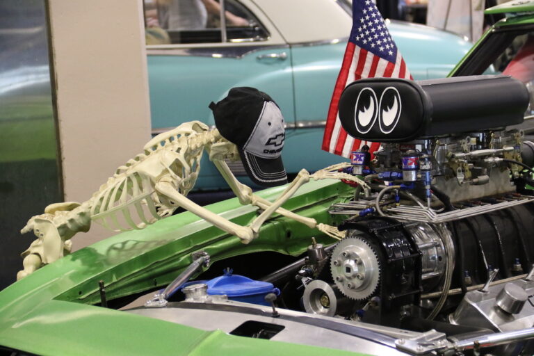 Some cars were still being worked on at the Philadelphia Auto Show on Sunday. This mechanic did not respond to a request for an interview.