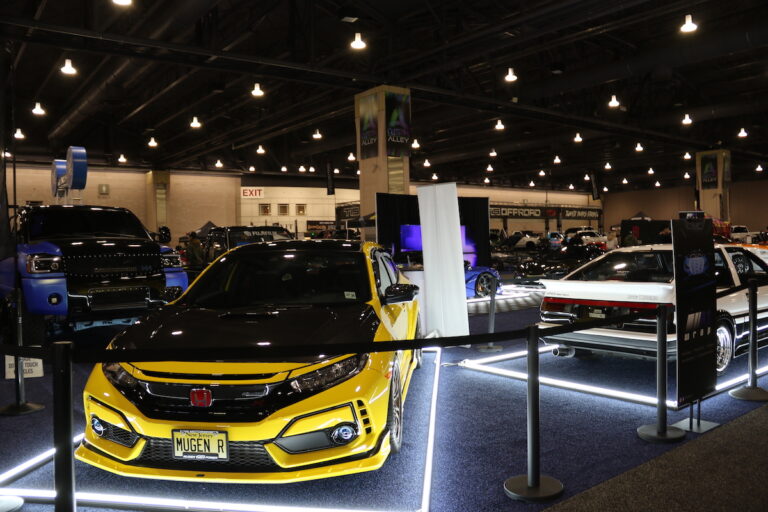 Imports and American made vehicles are lined up throughout the Custom Alley.