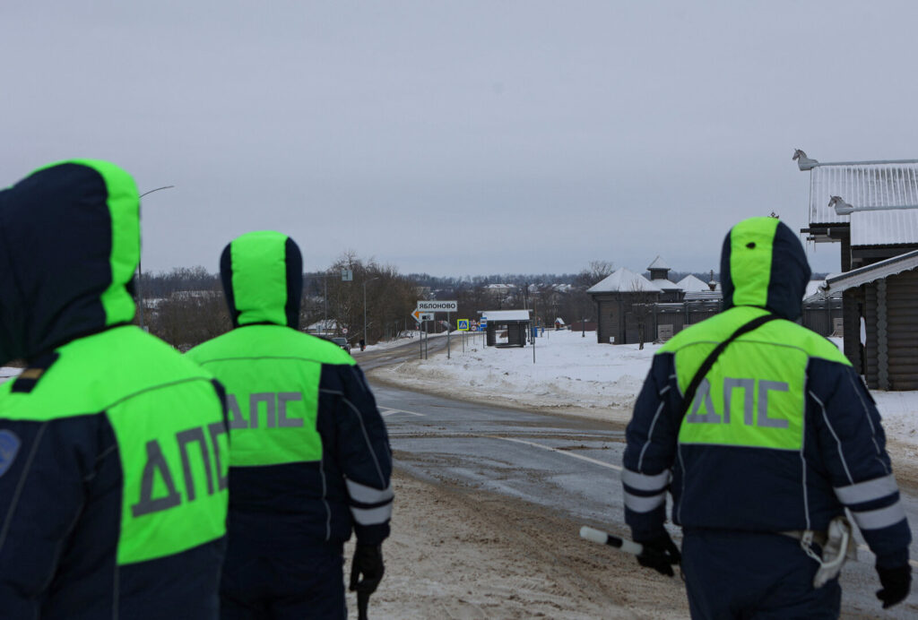 Traffic police officers block off a road near the crash site of the Russian Ilyushin Il-76 military transport plane in Belgorod Region Traffic police officers block off a road near the crash site of the Russian Ilyushin Il-76 military transport plane outside the village of Yablonovo in Russia's Belgorod region on Wednesday. Stringer/Reuters