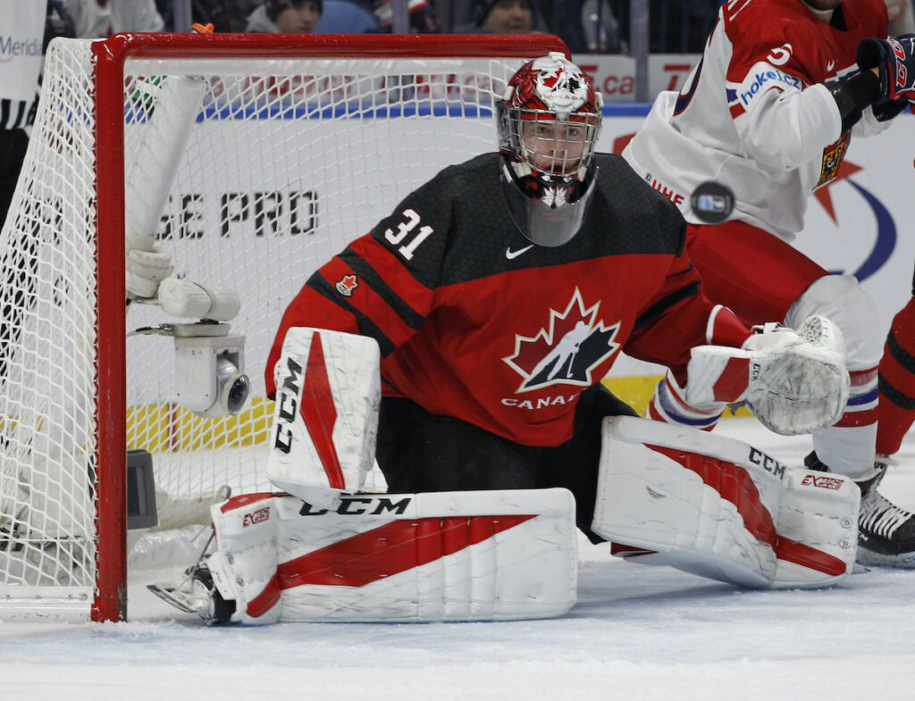 World Juniors Czech Republic Canada Hockey File photo: Canada goalie Carter Hart (31) makes a save during the first period in the semifinals of the world junior championships against the Czech Republic, Thursday, Jan. 4, 2018, in Buffalo, N.Y. (AP Photo/Jeffrey T. Barnes)