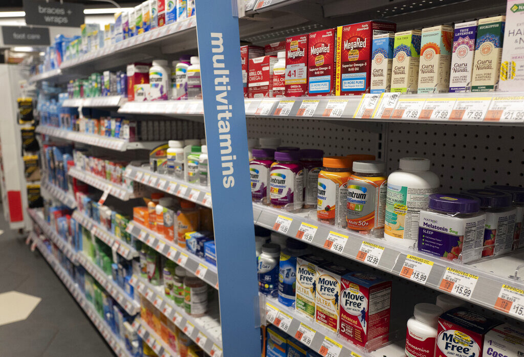 Earns Walgreens Vitamins are displayed in pharmacy Duane Reade by Walgreens, Thursday, March 25, 2021, in New York. Walgreens reports earnings March 31, 2021. (AP Photo/Mark Lennihan)