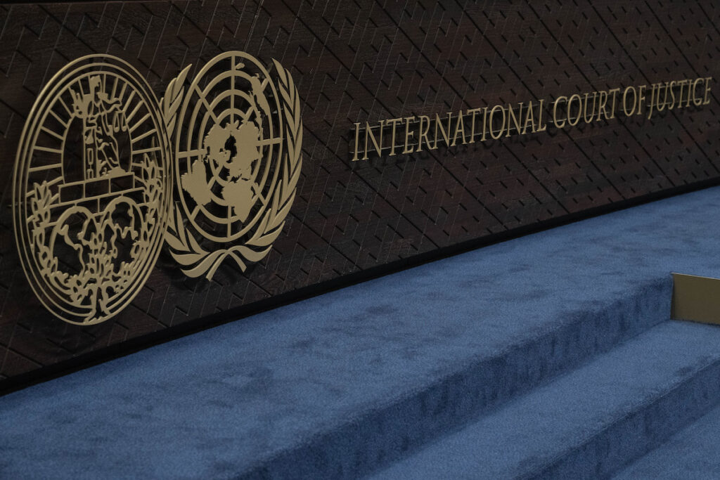 World Court Armenia Azerbaijan The logo of the International Court of Justice (left) and that of the U.N. (right). (AP Photo/Peter Dejong)