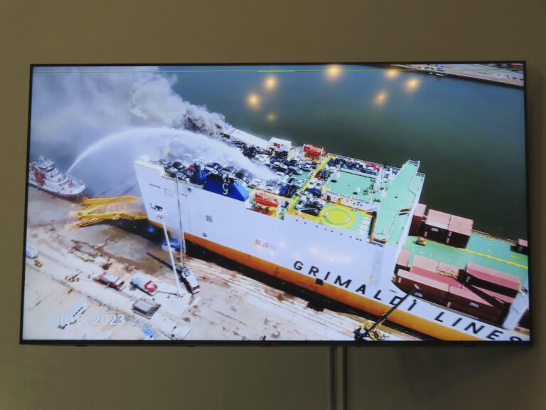 A photo displayed on a video monitor in Union,N.J., Wednesday, Jan. 10, 2024 shows a burning cargo ship in Newark N.J. on July 5, 2023.