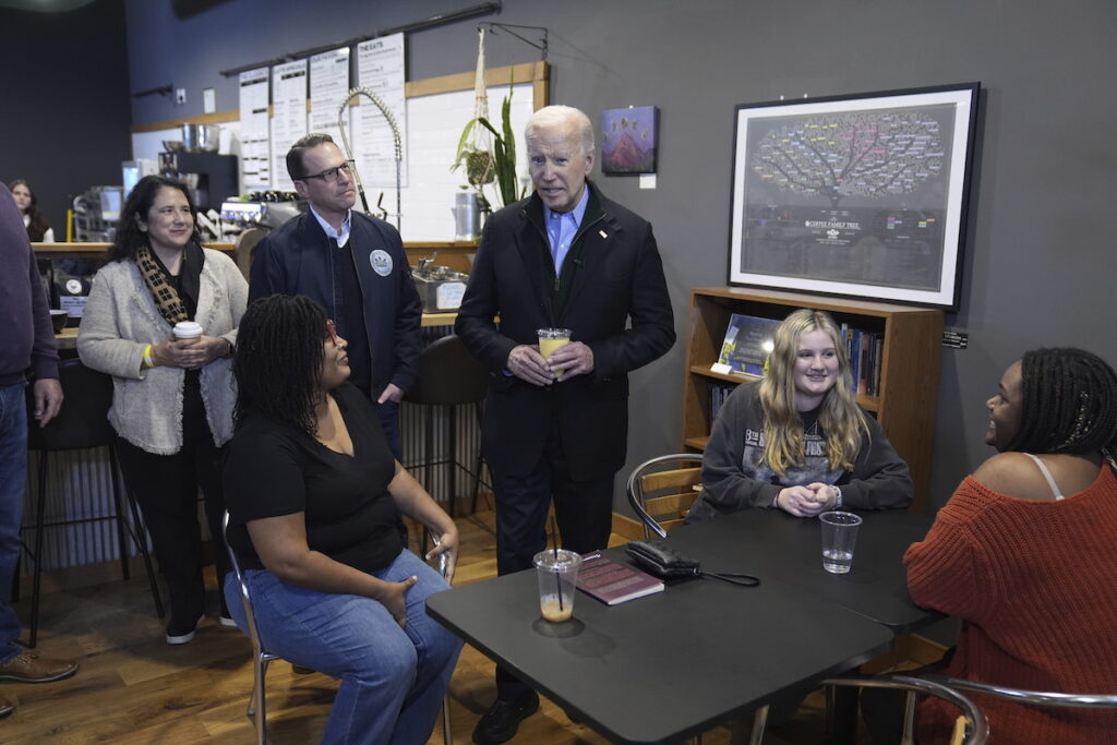 Joe Biden President Joe Biden talks to employees at the Nowhere Coffee shop, during a visit to discuss his economic agenda, Friday, Jan. 12, 2024, in Emmaus, Pa. (AP Photo/Evan Vucci)