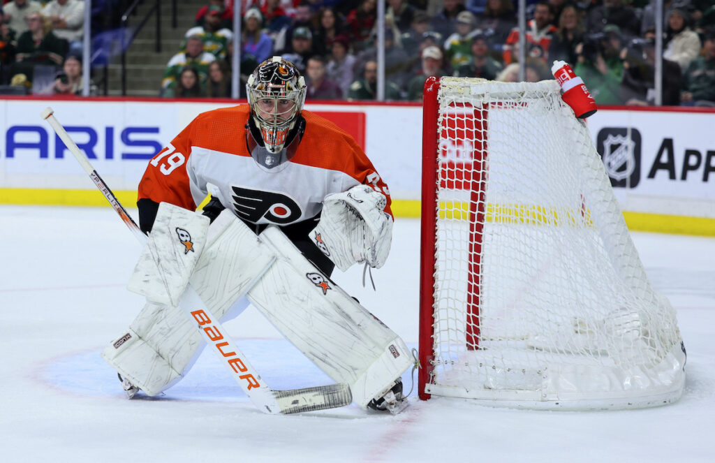 Flyers Wild Hockey Philadelphia Flyers goaltender Carter Hart watches the puck during the third period of the team's NHL hockey game against the Minnesota Wild on Friday, Jan. 12, 2024, in St. Paul, Minn.