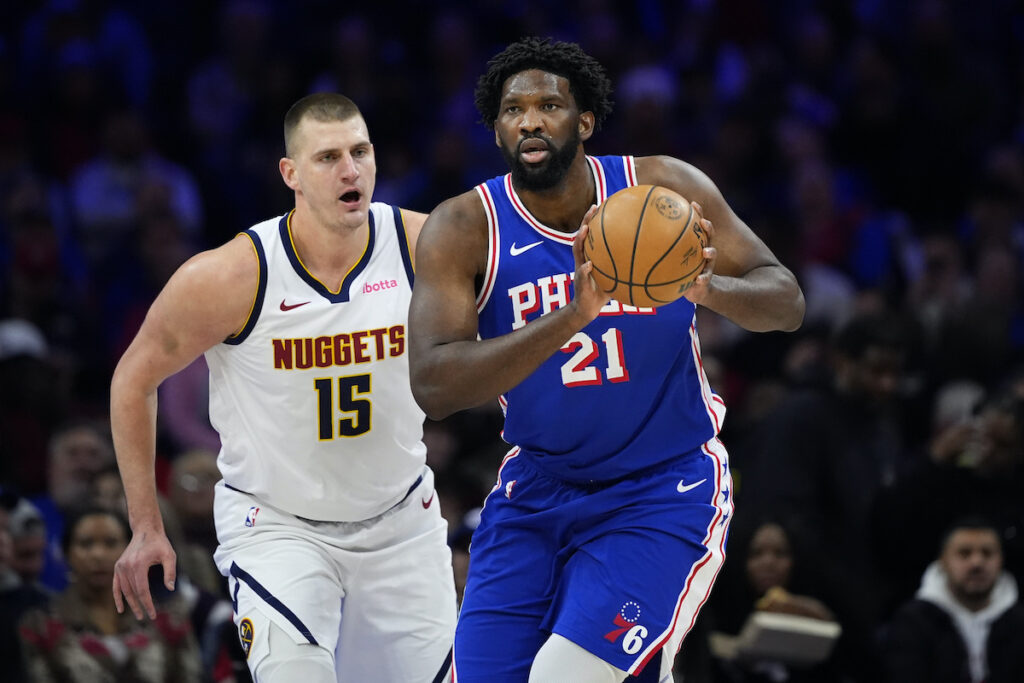 Nuggets 76ers Basketball Philadelphia 76ers' Joel Embiid (right) tries to keep away from Denver Nuggets' Nikola Jokic during the first half of an NBA basketball game, Tuesday, Jan. 16, 2024, in Philadelphia. (AP Photo/Matt