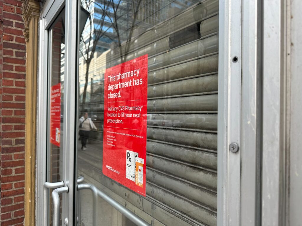 Sign on the door of Rite Aid