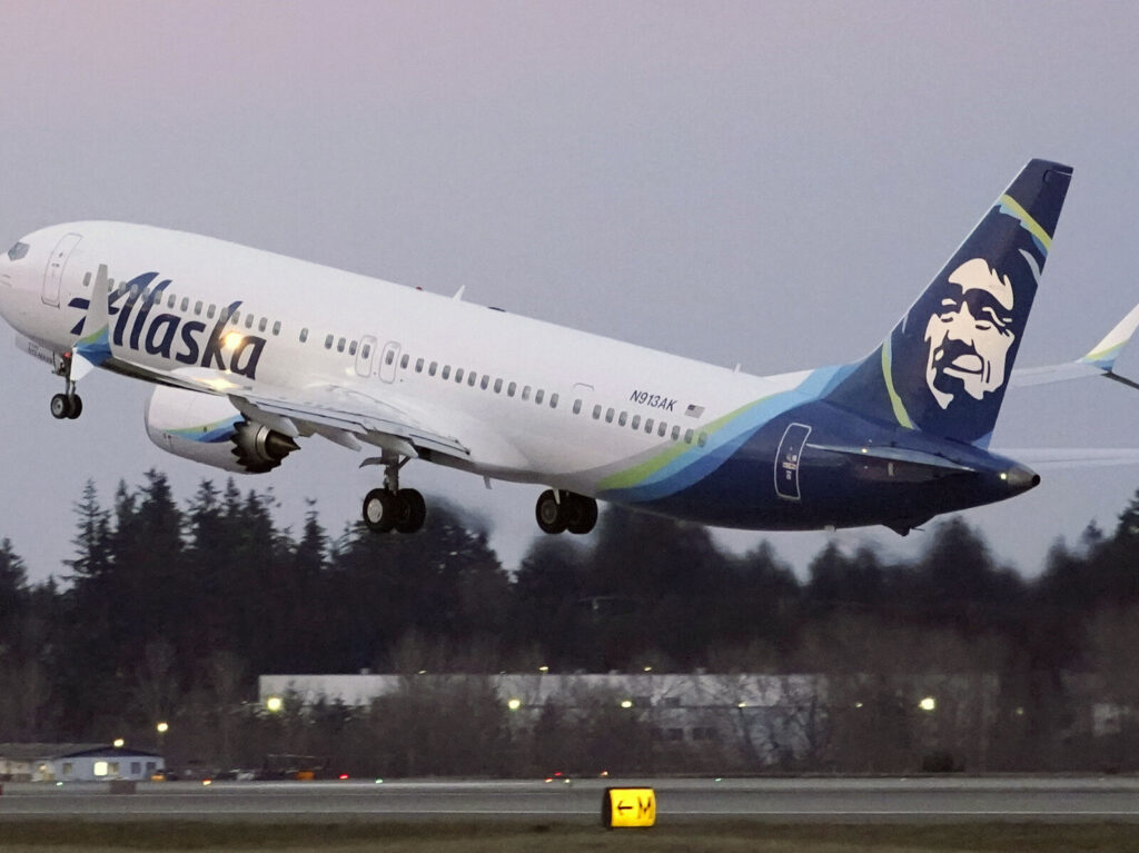 The first Alaska Airlines passenger flight on a Boeing 737-9 Max airplane takes off on a flight to San Diego from Seattle-Tacoma International Airport in Seattle on March 1, 2021. (Ted S. Warren/AP)