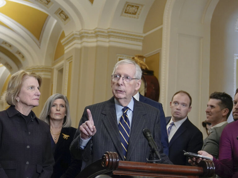 Sen. Minority Leader Mitch McConnell, R-Ky. (center) speaks at a news conference after a policy luncheon on Capitol Hill Wednesday, Jan. 17, 2024, in Washington.