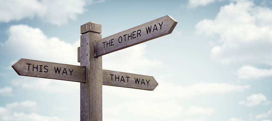 Crossroad signpost saying this way, that way, the other way conc Crossroad signpost saying this way, that way, the other way concept for lost, confusion or decisions