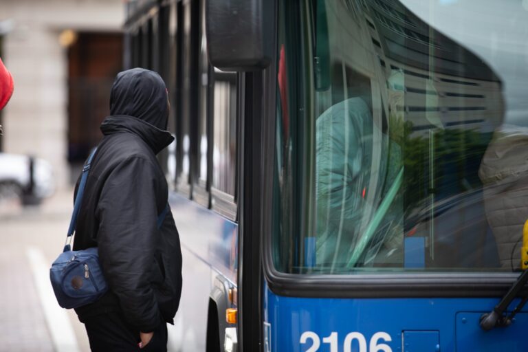 Person boarding a bus