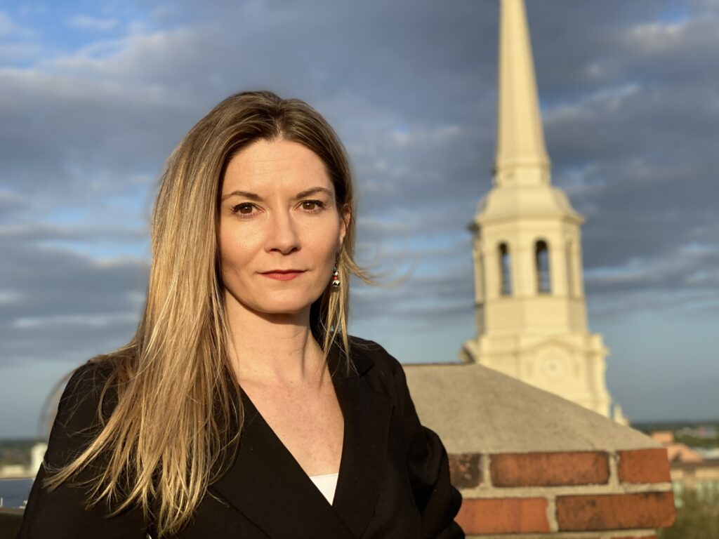 Kate Quinn poses for a photo