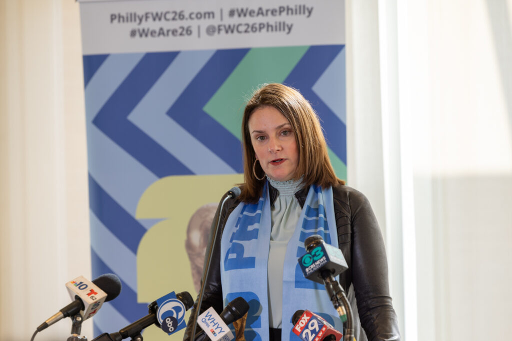 02 05 2024 k paynter reduced size meg kane FIFA World Cup in Philly reax 2026 Meg Kane speaking at a podium