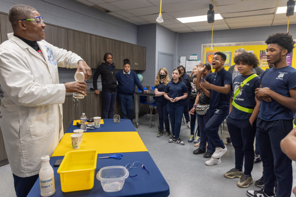 02 06 2024 k paynter reduced size group experiment middle school science demo with grand hank School science experiment