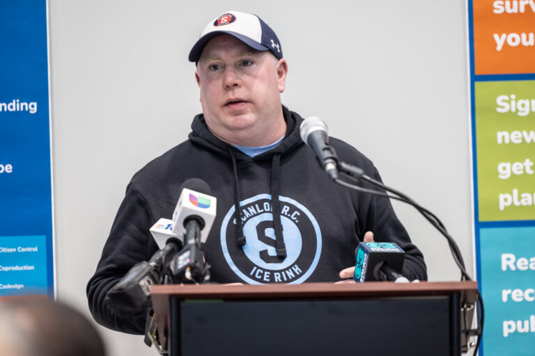 Eric Kurtz speaking at a podium