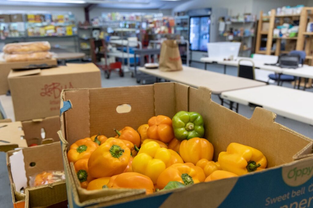 06-28-2023-k-paynter-narberth-community-food-bank-2 A box of bell peppers sitting on a table