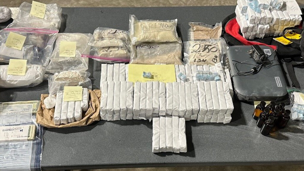 2024-02-06-Evidence drugs and money on a table