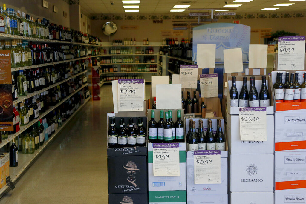 Virus Outbreak Pennsylvania Liquor Shelves of merchandise at the Pennsylvania Wine and Liquor store in Seven Fields, Pa, are seen through the window
