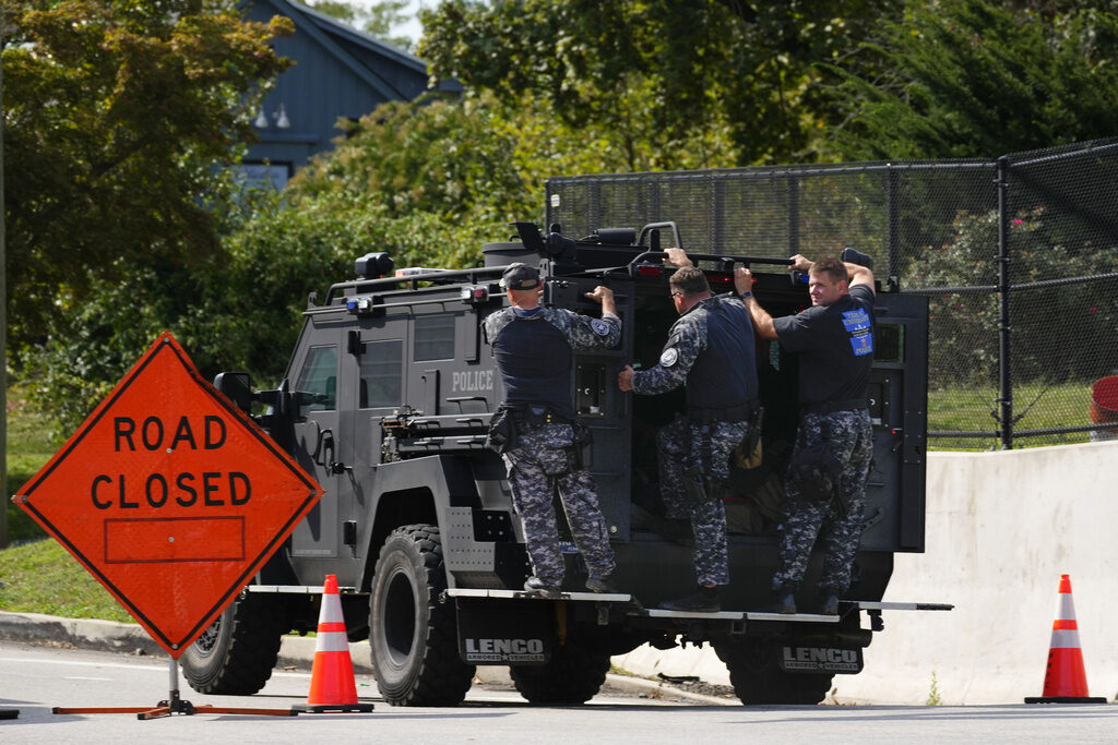 Prisoner Escape Pennsylvania Law enforcement officers ride by a roadblock as the search for escaped convict Danilo Cavalcante continues in Pottstown, Pa., Tuesday, Sept. 12, 2023.