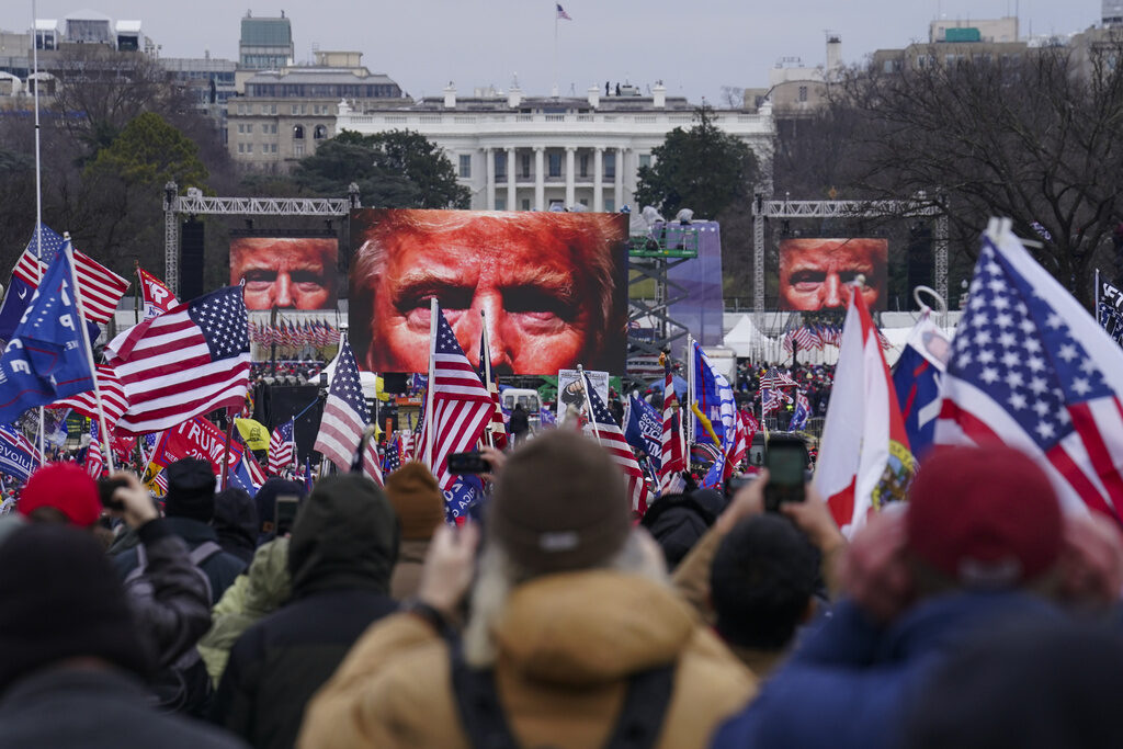 Trump supporters participate in a rally in Washington, Jan. 6, 2021, that some blame for fueling the attack on the U.S. Capitol. On Thursday, Feb. 8, the nation's highest court is scheduled to hear arguments in a case involving Section 3 of the 14th Amendment, which prohibits those who “engaged in insurrection or rebellion” from holding office. The case arises from a decision in Colorado, where that state's Supreme Court ruled that Trump violated Section 3 of the 14th Amendment and should be banned from ballot. (AP Photo/John Minchillo)