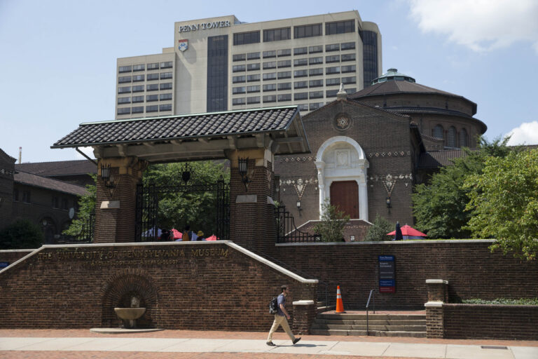 A man walks past the The Penn Museum, part of the University of Pennsylvania