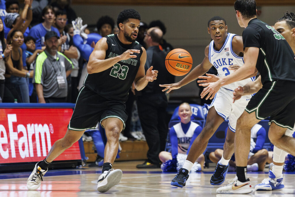 Dartmouth NLRB Union Basketball File photo: Dartmouth's Robert McRae III (23) takes a pass from Jackson Munro (33) as Duke's Jaylen Blakes (2) defends during the second half of an NCAA college basketball game in Durham, N.C., Nov. 6, 2023.