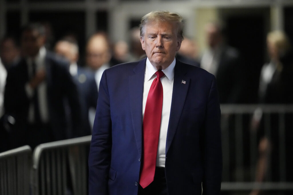 Former President Donald Trump leaves Manhattan criminal court, Thursday, Feb. 15, 2024, in New York.