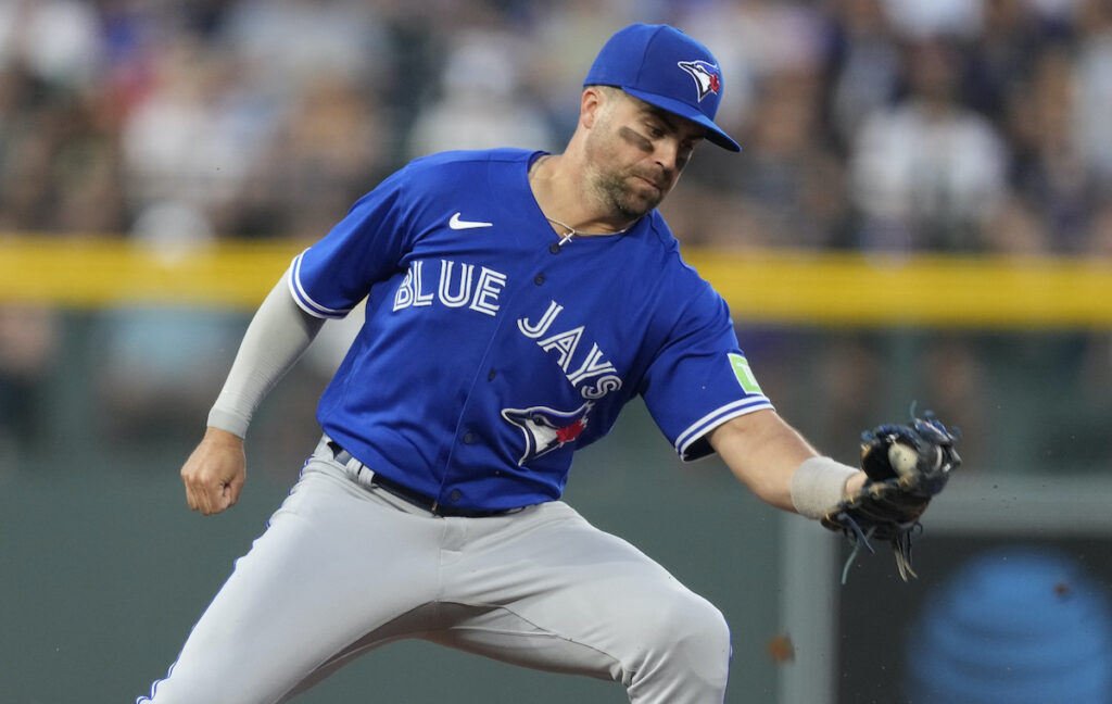 Phillies Merrifield Baseball File photo: Toronto Blue Jays second baseman Whit Merrifield gloves the ball during the team's baseball game against the Colorado Rockies on Sept. 2, 2023, in Denver. The Philadelphia Phillies have reached a contract agreement with utility infielder Merrifield, a person familiar with the decision told The Associated Press on Friday, Feb. 16, 2024.