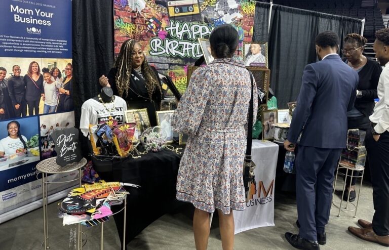 Tanya Morris, CEO of Mom Your Business, speaks to attendees of the Black Business Expo in Philadelphia