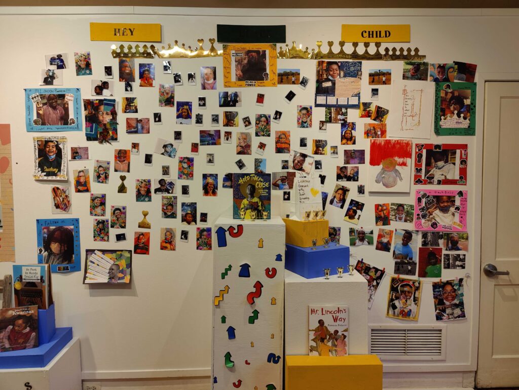 A collage wall of photos taken by an ongoing cohort of young people who have collaborated with Sabriaya Shipley on art projects for years.