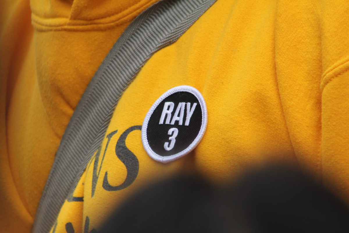 Philadelphia Suns members wore patches honoring Raymond Ling who passed away in 2023. (Cory Sharber/WHYY)