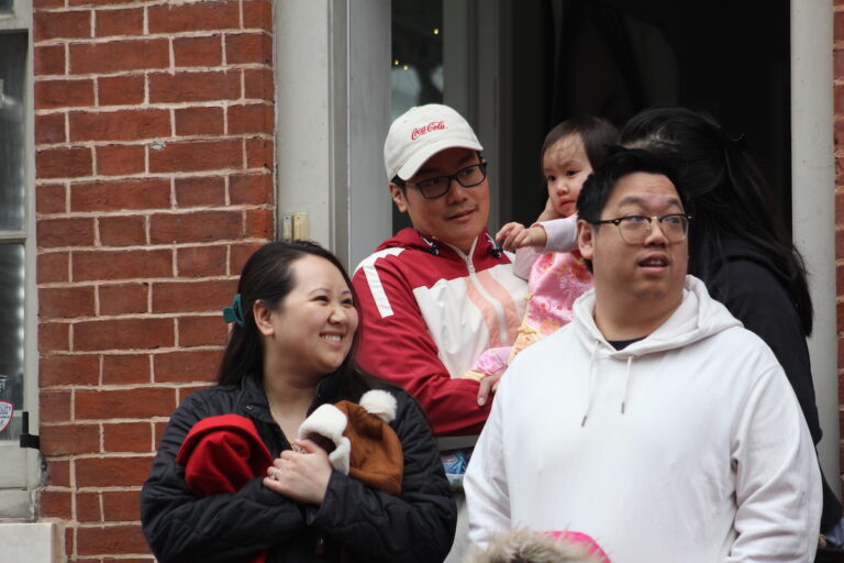Generations of Philadelphians flocked to Chinatown for the Lunar New Year Parade on Feb. 11, 2024. (Cory Sharber/WHYY)
