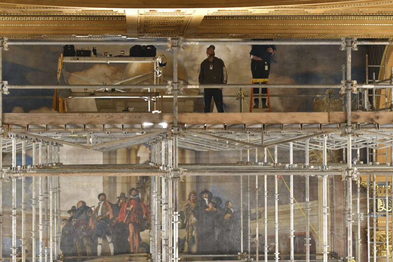Workers repair damage in the Pa. Capitol