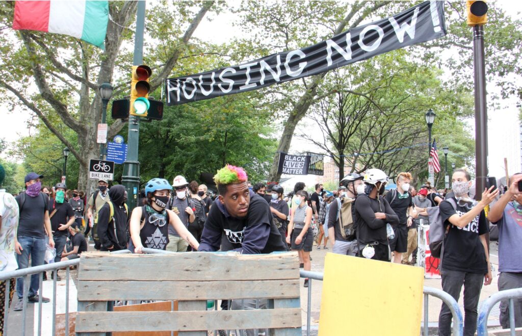 Screenshot-2024-02-16-at-4.18.12-PM Protesters wait behind blockades to defend the Parkway encampment in September 2020.