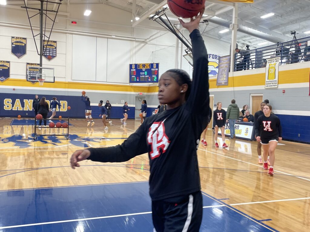 Taylor Brown warming up on the court