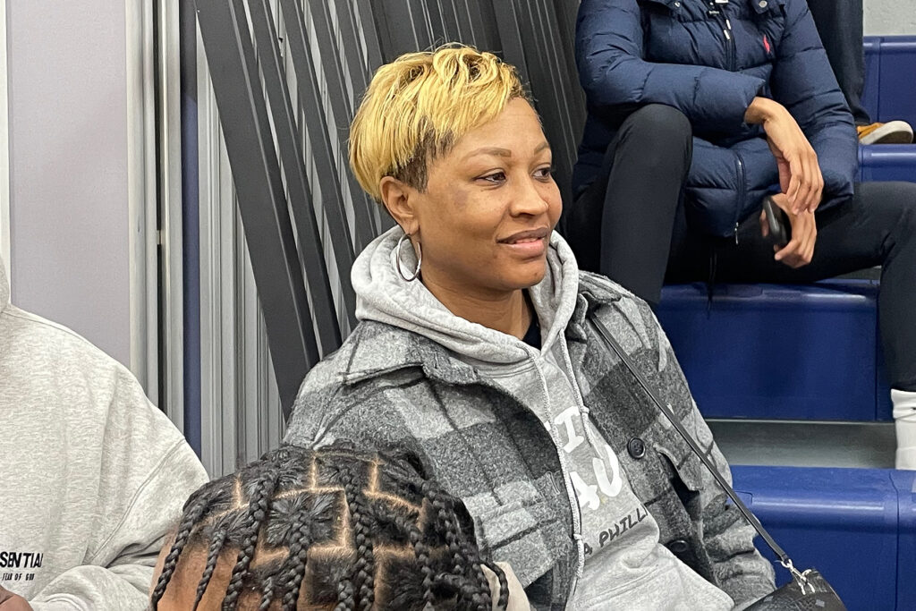 Kelli Brown sitting in the stands