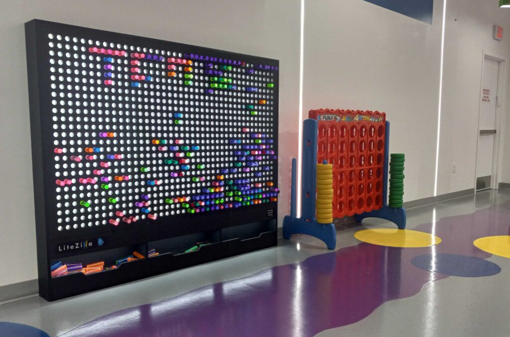 kids-at-play-m-biddle-2024-02-02-2 Large light-up touch panel