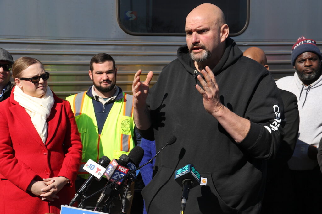 U.S. Senator John Fetterman speaks at a podium